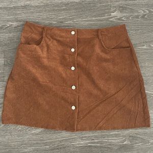 Burnt orange corduroy skirt with buttons